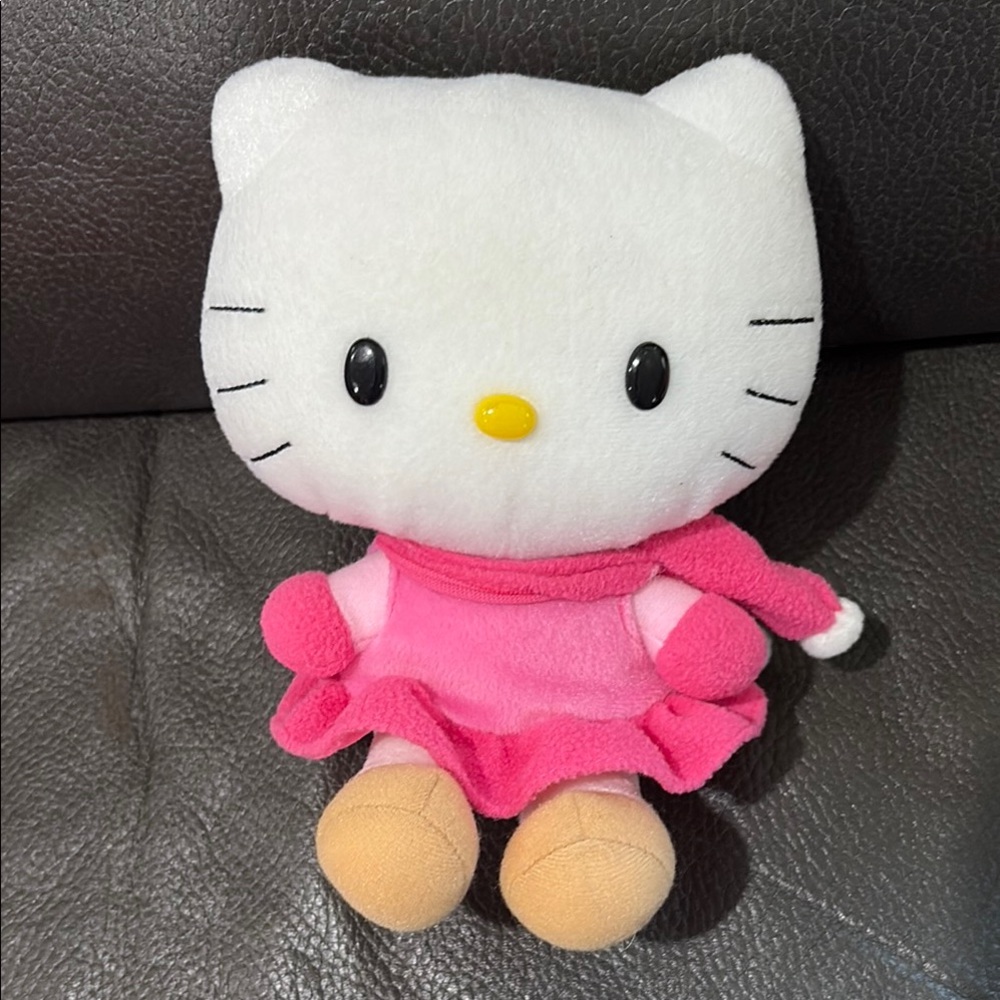 Hello kitty stuffed animal in cute fleece pink dress and scarf